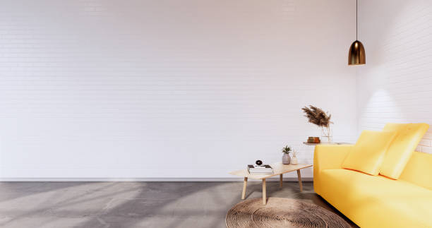 istock Loft style with white wall on wooden floor and sofa armchair on carpet.3D rendering 1364802483