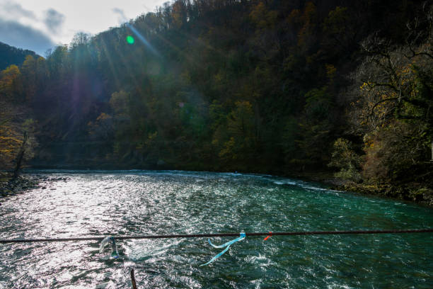 Landscape with a mountain river in late autumn. Bzyb river in the Caucasus mountains in Abkhazia.
