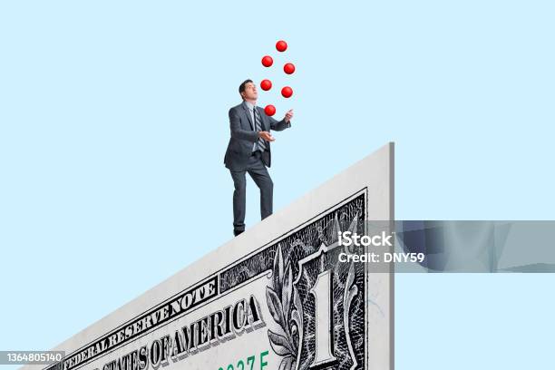 Balancing And Juggling Finances Stock Photo - Download Image Now - Inflation - Economics, Juggling, Businessman