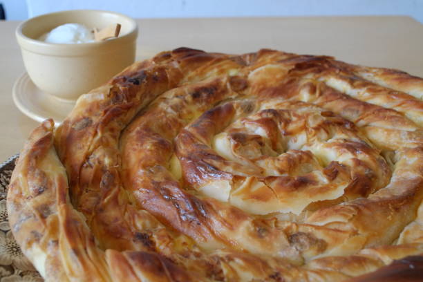 istock Traditional Serbian rolled cheese pie on a plate 1364811539