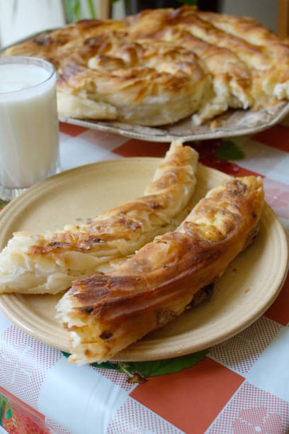 istock Piece of cheese pie on a plate 1364811845