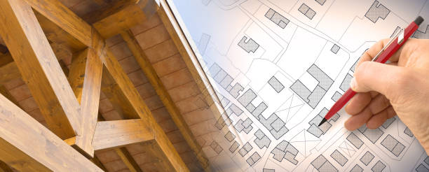 istock Lower environmental impact for wooden buildings - CO2 Net-Zero Emission and Carbon Neutrality concept with a wooden architecture and imaginary city plan 1364811993