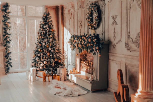istock Christmas theme interior room with gifts under a Christmas tree and a fireplace 1364812919