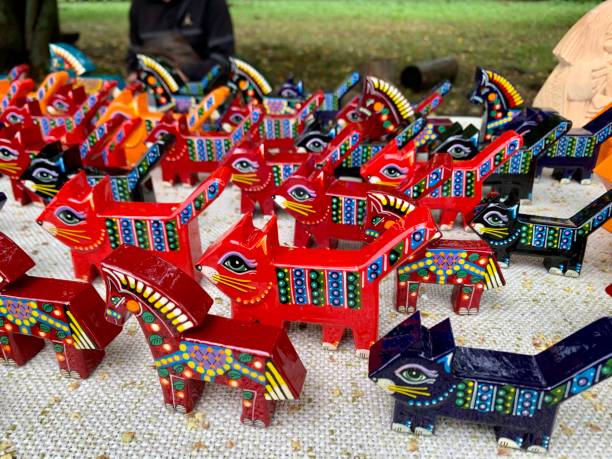 istock Handmade wooden toys cats 1364818599