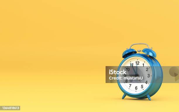 3d Render Blue Alarm Clock On Yellow Background Stock Photo Stock Photo - Download Image Now