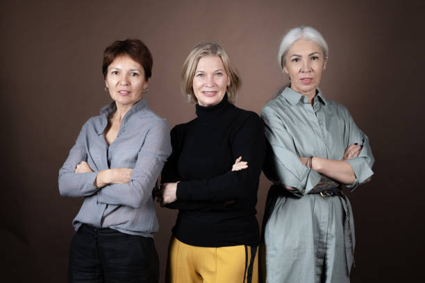istock Beautiful mature women posing at camera 1364824048