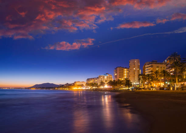 istock Marbella sunset beach in Playa de la fontanilla in Malaga 1364824150