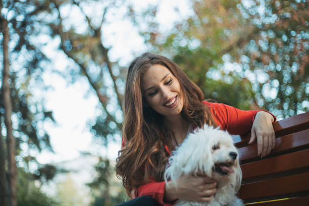 istock woman with dog 1364825488