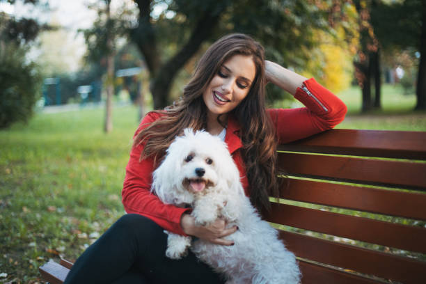 istock woman with dog 1364825492