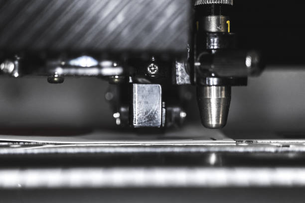 Modern plotter laser cutter machine in print house industry, close-up view