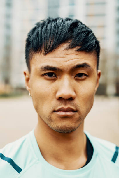 istock Headshot of Chinese man before jogging 1364829798