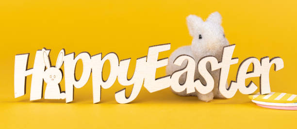 istock Happy easter greetings, banner. Easter bunny, celebration background with text. Spring holiday concept photo 1364830534