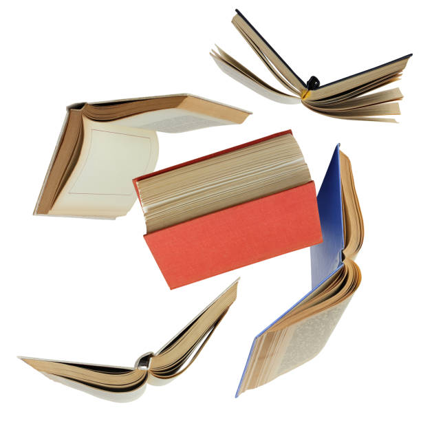 istock open paper books in the air, isolated on a white background. 1364833003