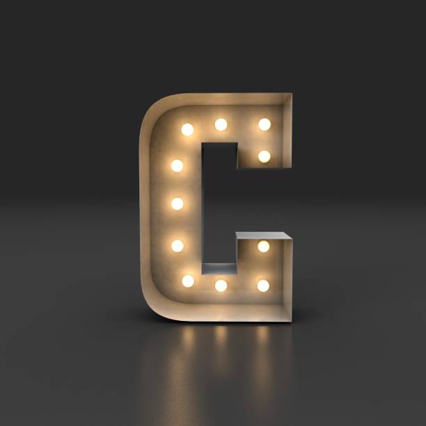 istock 3D Rendering. Retro white box letter C with filament bulb illuminated light reflected on a black background. 1364838227
