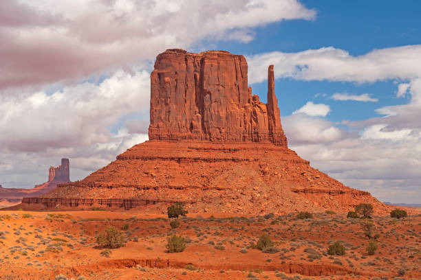 istock Dramatic Butte Rising From the Red Sands 1364841585