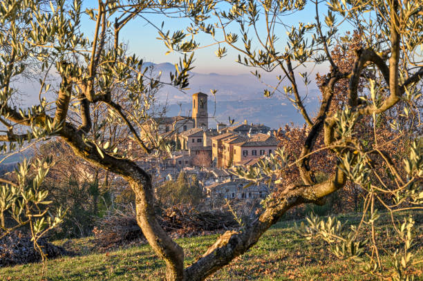 Window on the villages, Bettona Bettona is an Italian town of 4 327 inhabitants in the province of Perugia that stands on the northeastern border of the Martani Mountains. It is included among the most beautiful villages in Italy ancient villages stock pictures, royalty-free photos & images