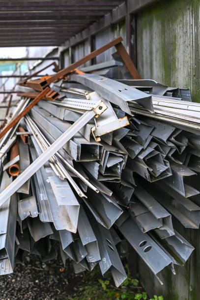 metal profile channel at a construction site in the form of scrap metal stock photo
