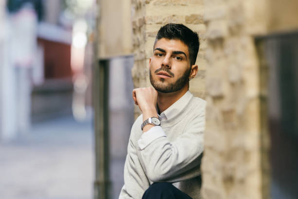 istock Handsome caucasian man posing outdoors 1364854342