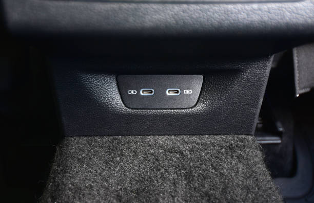 Two USB C ports for the rear seats in a passenger car stock photo