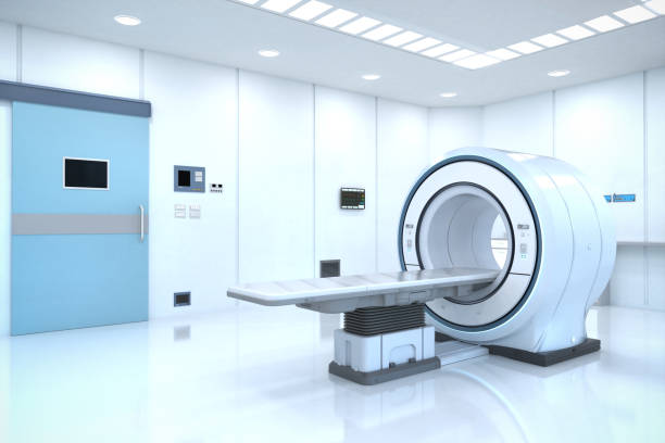 istock mri scan machine in room 1364860547