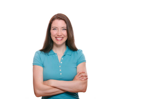 Studio shot of attractive young woman smiling at camera.
