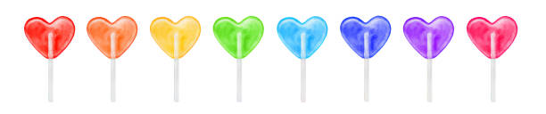 watercolour illustration set of cute heart shaped lollipops in rainbow color: red, orange, yellow, green, light blue, violet and pink. - lolipop illüstrasyonlar stock illustrations