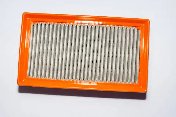 Renault or Nissan engine air filter protects the engine from abrasive particles and provides oxygen to the air-fuel mixture in specified proportions, selective focus