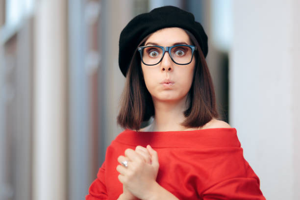 istock Surprised Chic Woman Wearing a Beret and Eyeglasses 1364876774