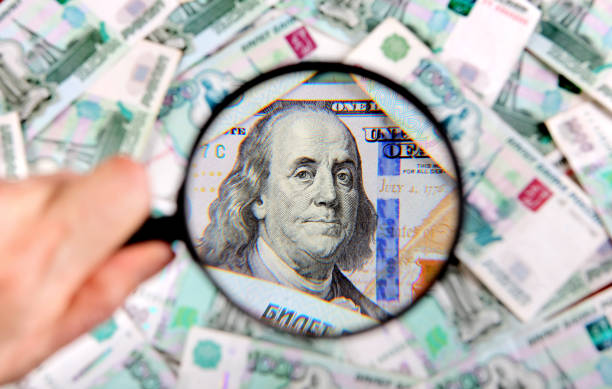 istock Magnifying Glass on the Money 1364883517
