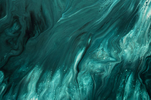 istock Fluid Art. Liquid emerald green abstract drips and wave. Marble effect background or texture 1364895005