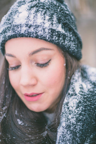 istock young woman enjoys cold winter day 1364899627