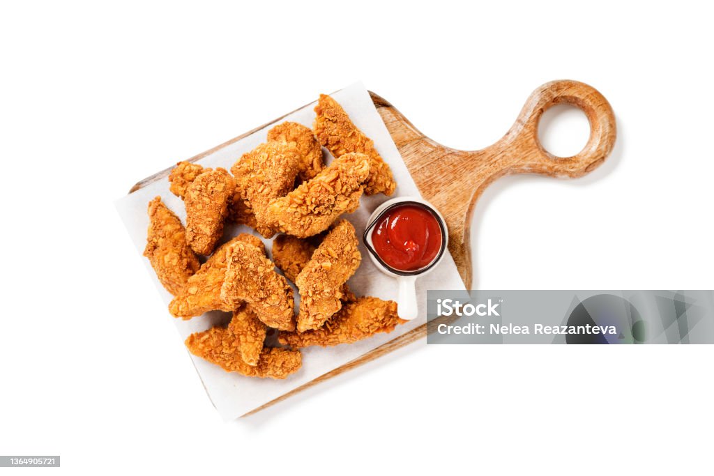crispy fried breaded chicken breast strips Delicious crispy fried breaded chicken breast strips with ketchup. Isolated on white background. top view Chicken Meat Stock Photo