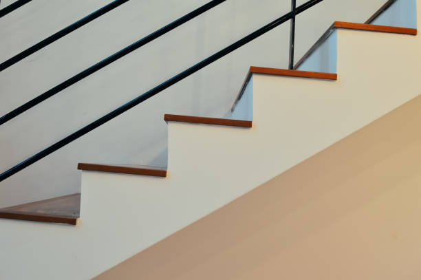 istock Stairs leading up in the modern house 1364907615