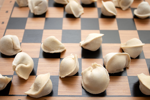 Dumplings are placed on a chessboard.