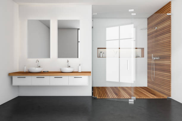 istock White bathroom interior with shower and two sinks with mirrors 1364913991