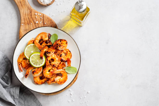 istock Grilled tiger shrimps with spice and lime 1364914761