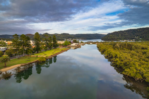 istock Clouds and reflections early morning waterscape 1364914824