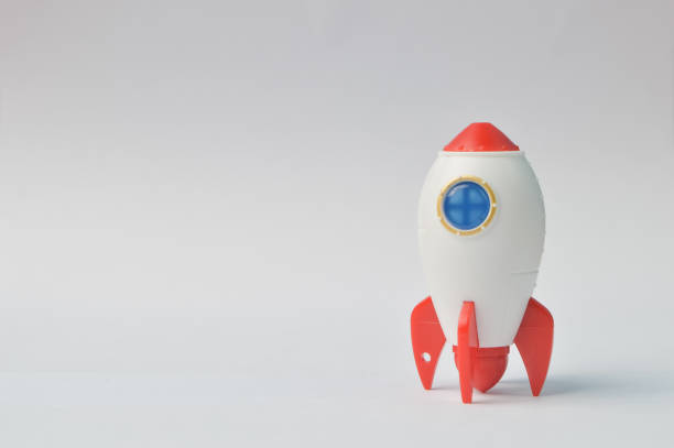 istock Toy rocket isolated on a white background 1364914915