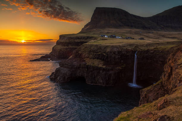 istock View of Mulafossur Waterfall, Faroe Islands. 1364915122