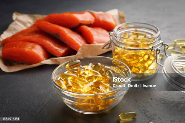Omega 3 Capsules And Salmon Red Fish Stock Photo - Download Image Now - Fish Oil, Omega-3, Salmon - Seafood