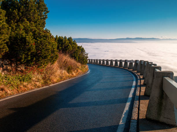 istock Landscape with clouds and a highway.