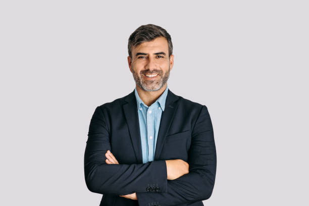 Businessman smiling with arms crossed on white background Front view of businessman smiling with arms crossed on white background clipping path photos stock pictures, royalty-free photos & images