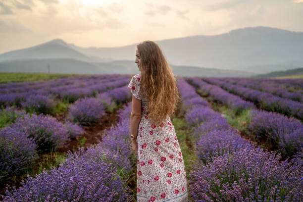 istock Young woman at a lavender field 1364917565