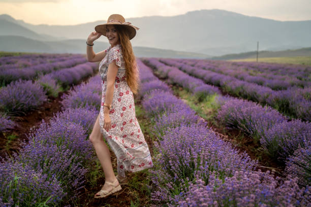 istock Young woman at a lavender field 1364917578