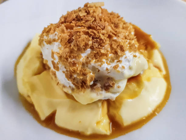 istock Close-up view of flan with ice cream 1364917735
