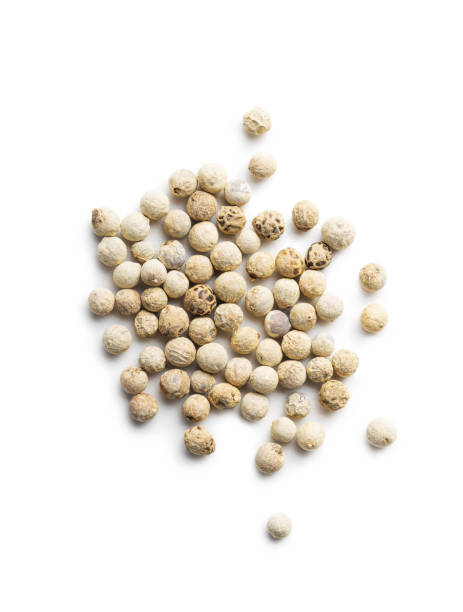istock Whole pepper spice. White peppercorn grain 1364919955