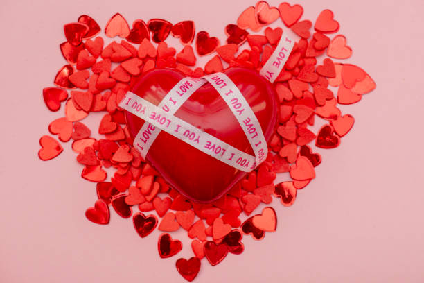 istock red heart on a pink background 1364924482