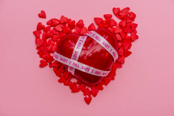 istock red heart on a pink background 1364924529