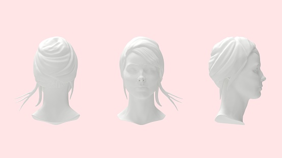 Set of silicone mannequins of a beautiful bald woman with make-up isolated on a white background.