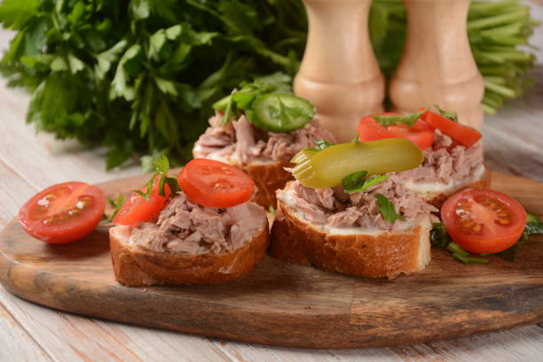 istock Open sandwich with canned tuna, cucumber, tomatoes, pickled cucumber 1364927131